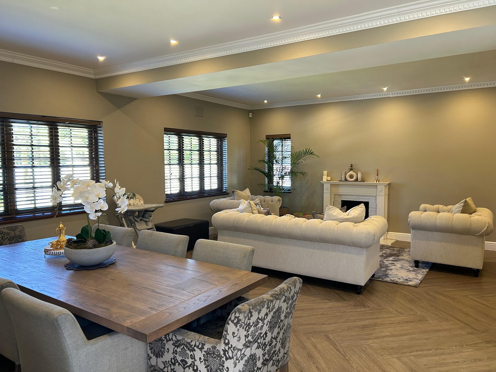 Wide view of the open-plan living areas with Allegro X Persimmon flooring