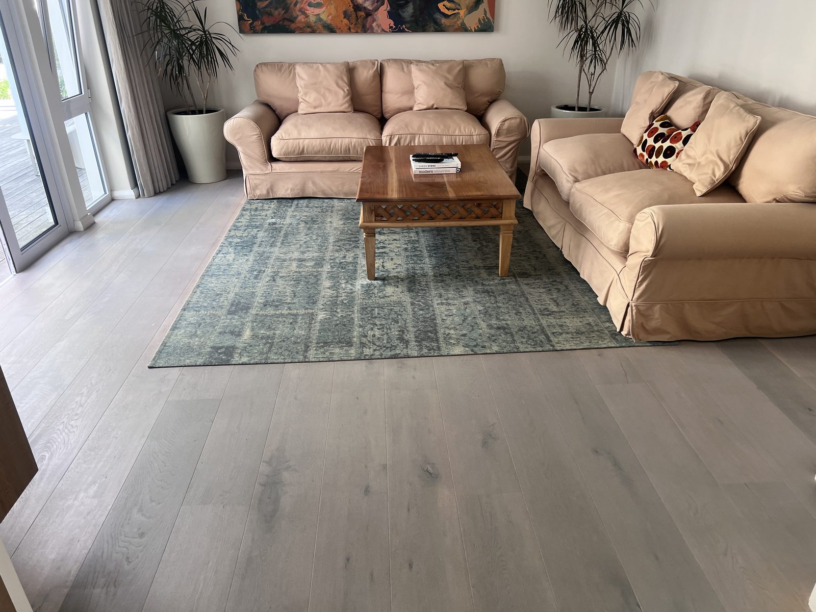 Bedroom with restored engineered oak flooring in a natural finish