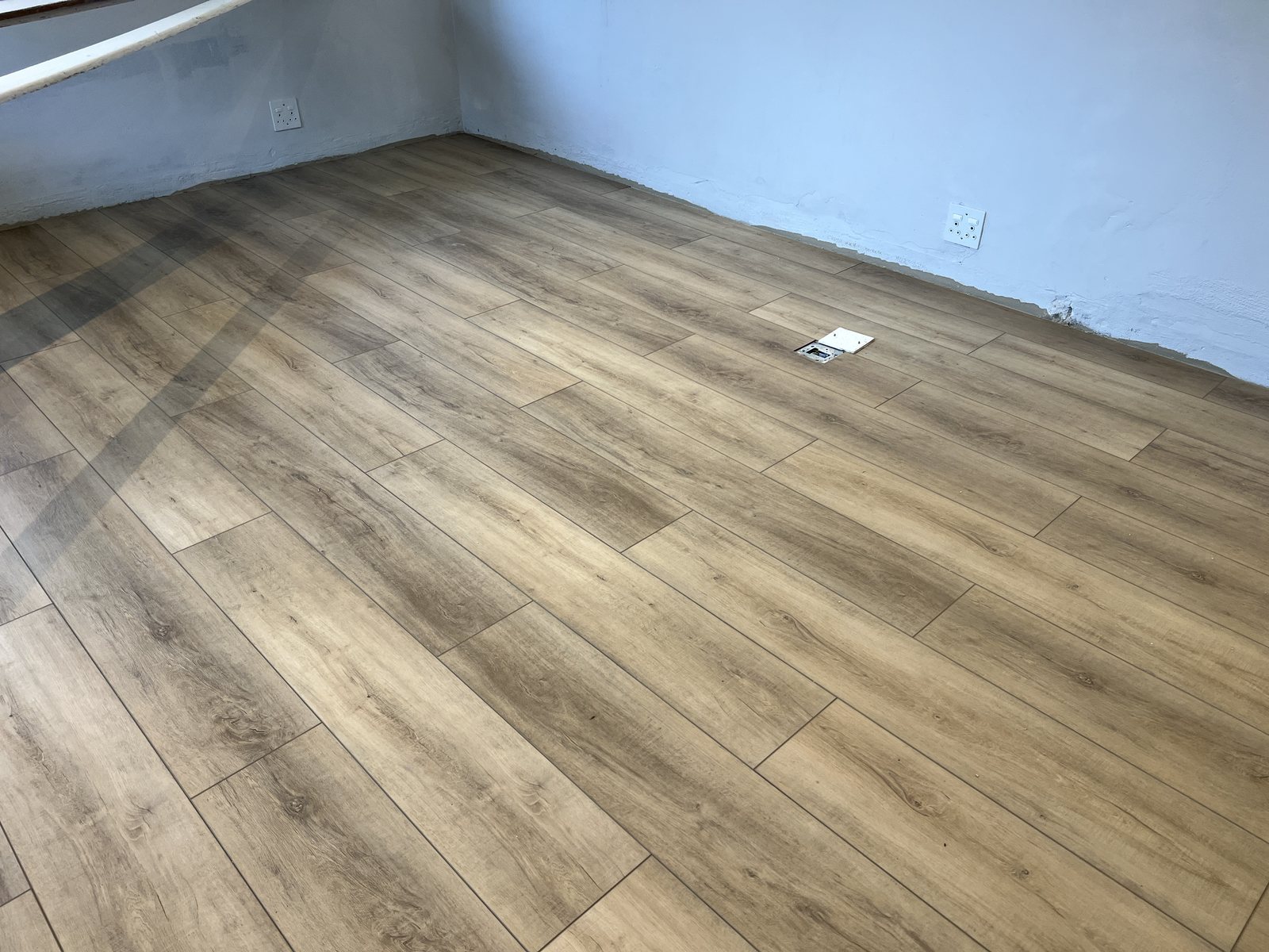 Como Mountain Range LVT in Sierra Madre, a warm four-sided-bevel wood look, in the clinic's front space